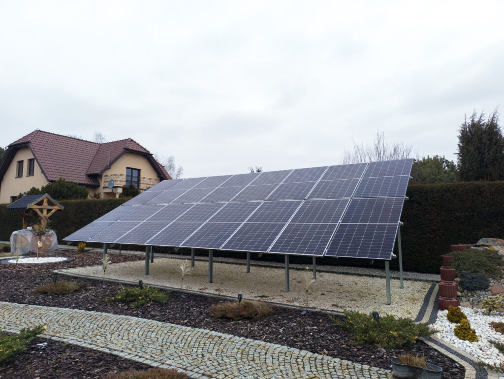 Ground mounted solar panels on landscaped residential land