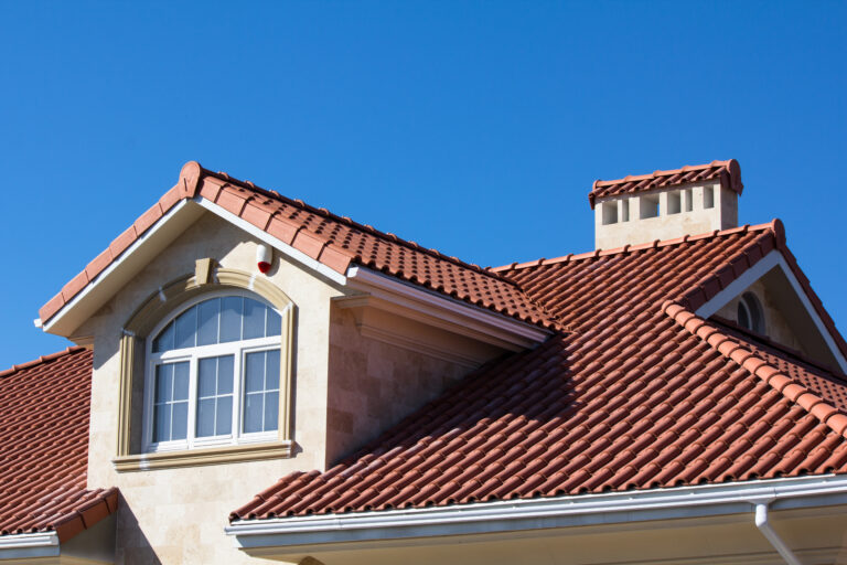 clay tile roof cost front view of big house