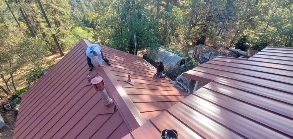 roofing lincoln ca workers repairing metallic roof