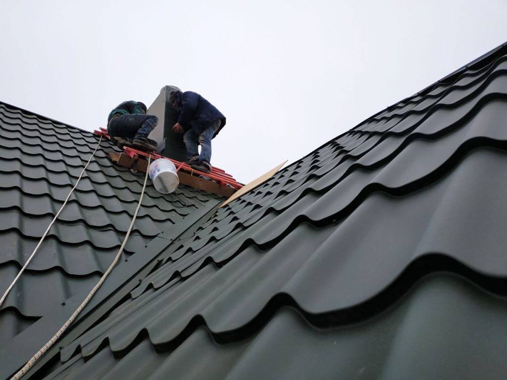 roof leak repair cost dark grey shingles roof