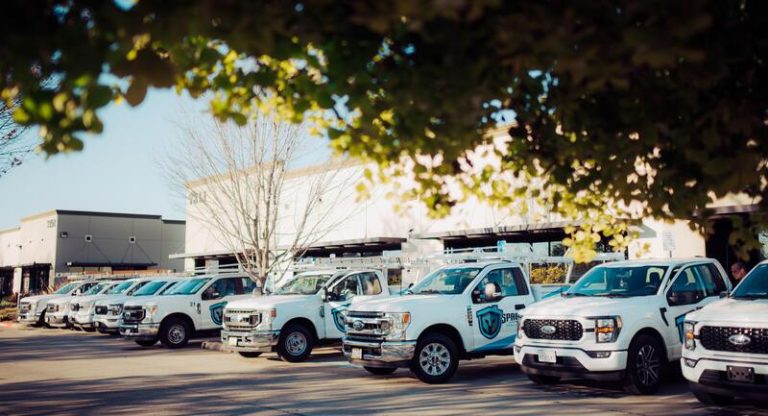Spartan Home Services truck fleet for roof repair in Folsom CA