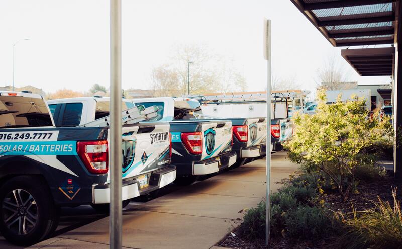 Spartan trucks parked at the office for roof repair in Citrus Heights CA